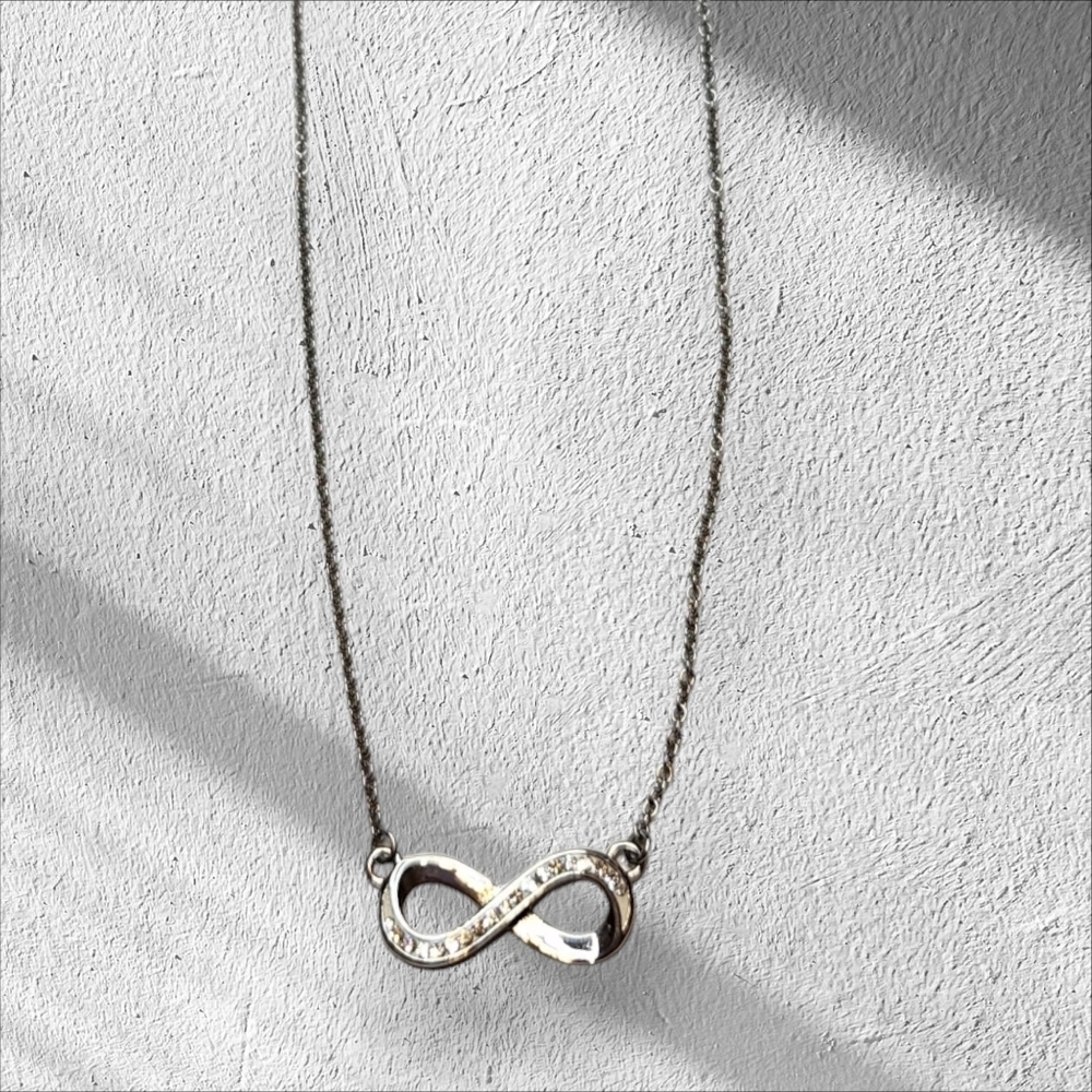 HMK LLC Stainless Steel Infinity Pendant Necklace with Crystal Accents